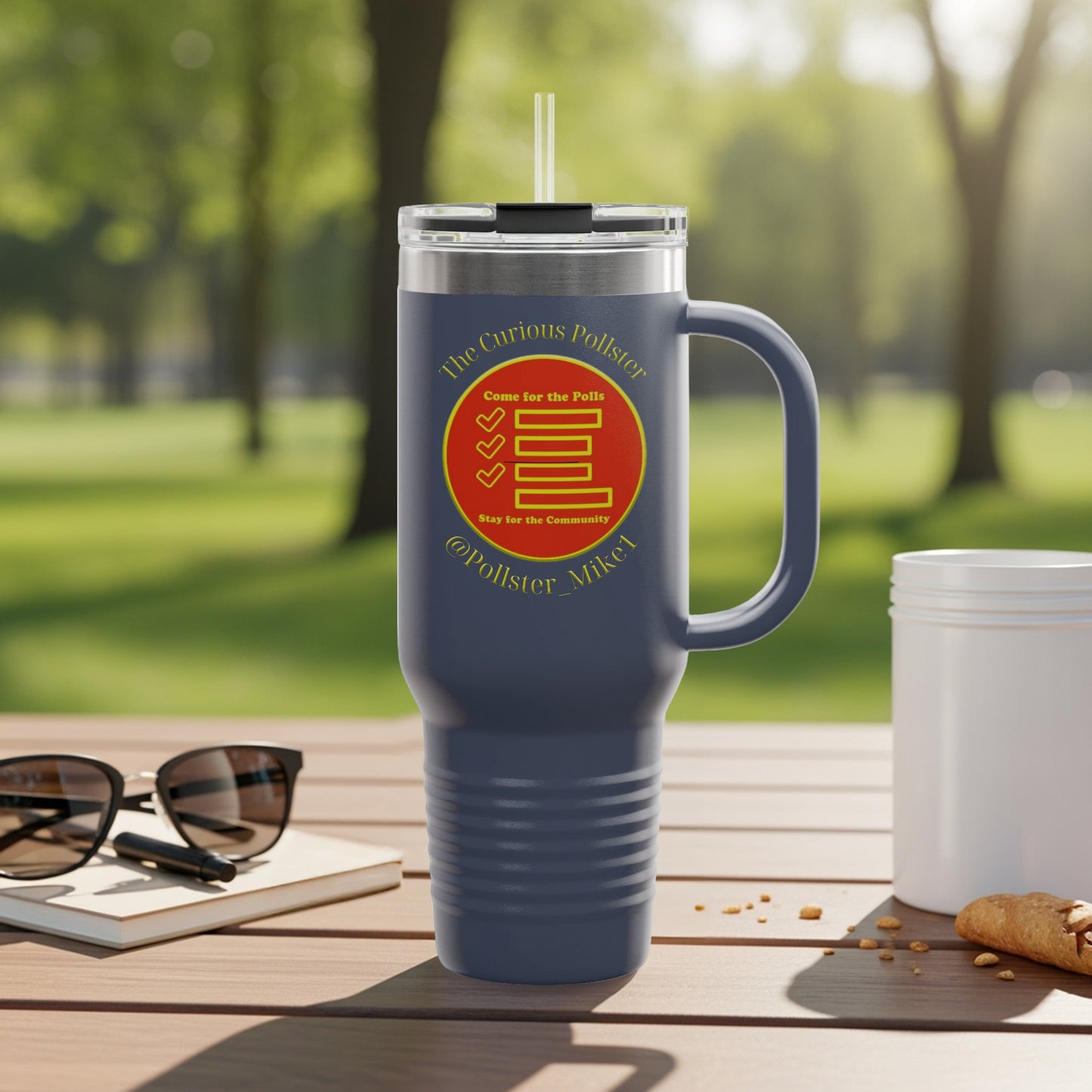 Navy tumbler with "The Curious Pollster" logo, featuring checkmarks and text.