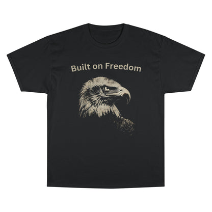 Built on Freedom text above an eagle head on a Champion Tee