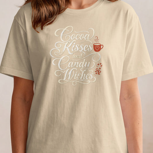 T-shirt with "Cocoa Kisses and Candy Wishes" text, a cocoa mug, and candy cane.