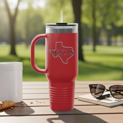 Red Texas tumbler with handle and straw on a table.
