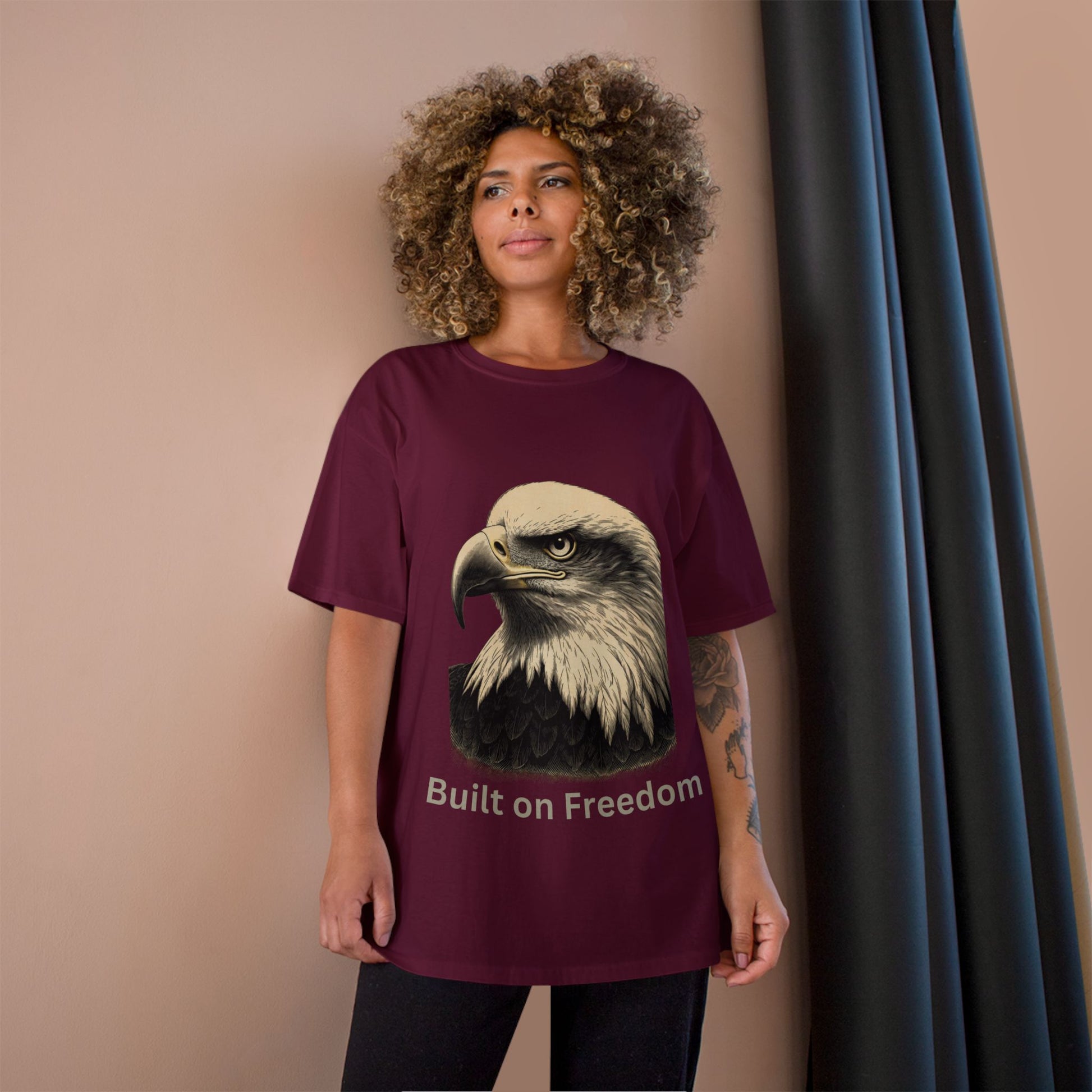 Engraved Eagle - Built of Freedom - text on the bottom of a Champion Tee
