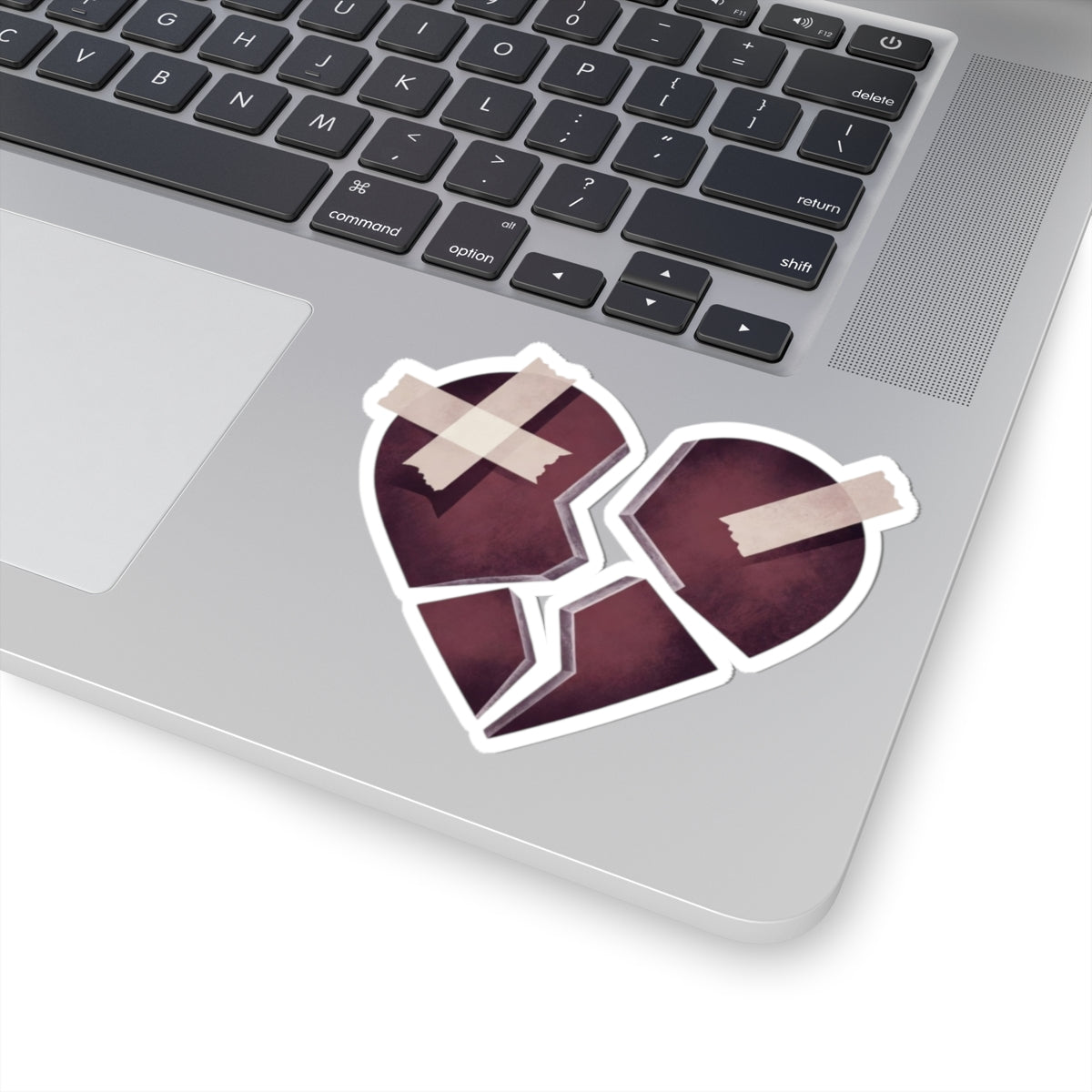Broken Heart with Bandages Sticker Design for Laptops