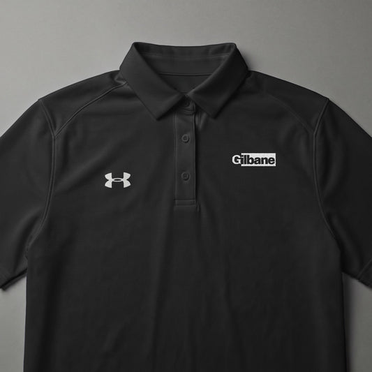 Black Under Armour polo shirt with Gilbane logo on chest.