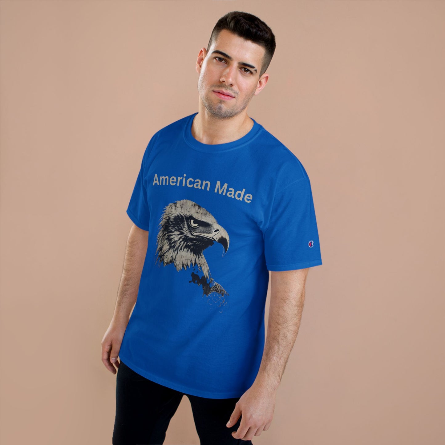 American Made text above an eagle head on a Champion Tee