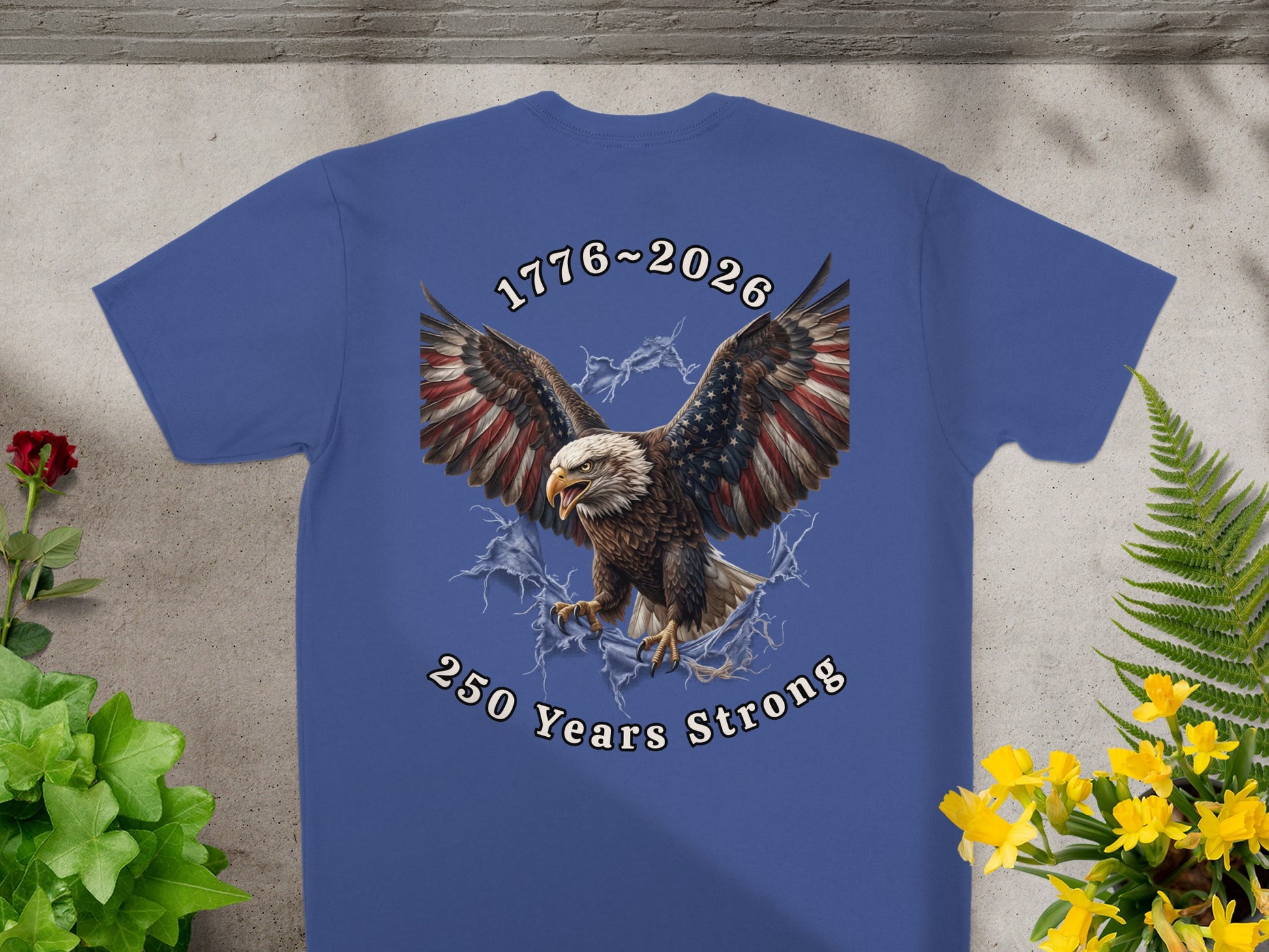 Blue t-shirt with eagle and "1776-2026 250 Years Strong" text.