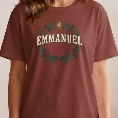 Brown t-shirt with a Christmas wreath graphic and text "EMMANUEL God With Us".
