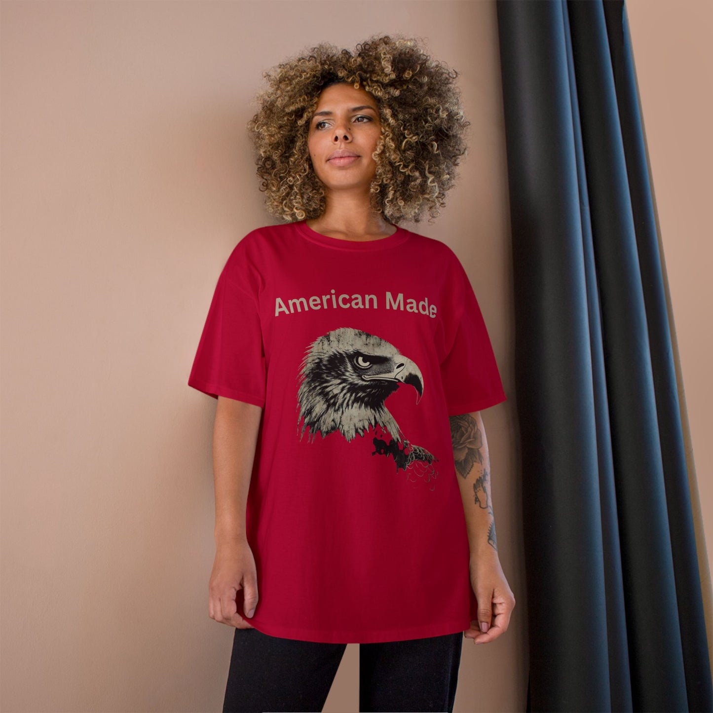 American Made text above an eagle head on a Champion Tee