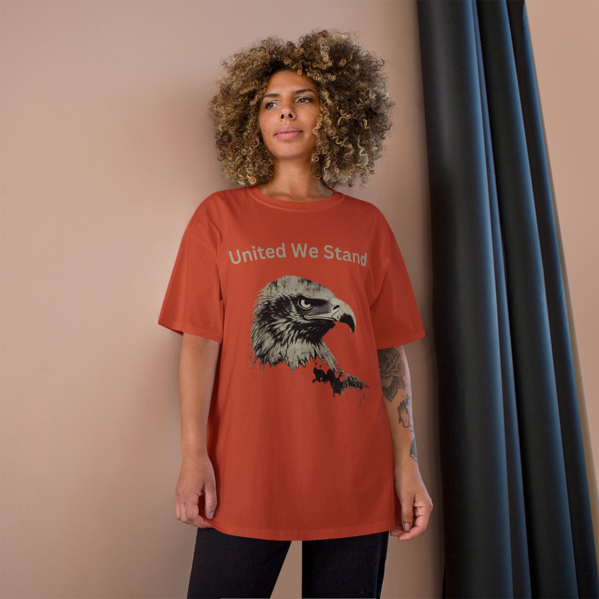 United We Stand text above an eagle head on a Champion Tee