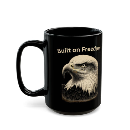 Black mug with bald eagle and "Built on Freedom" text.