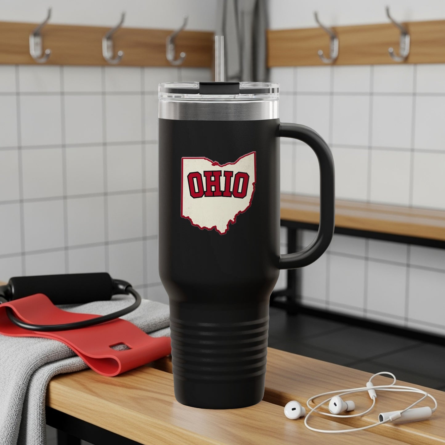 Travel mug with Ohio map graphic and city names.