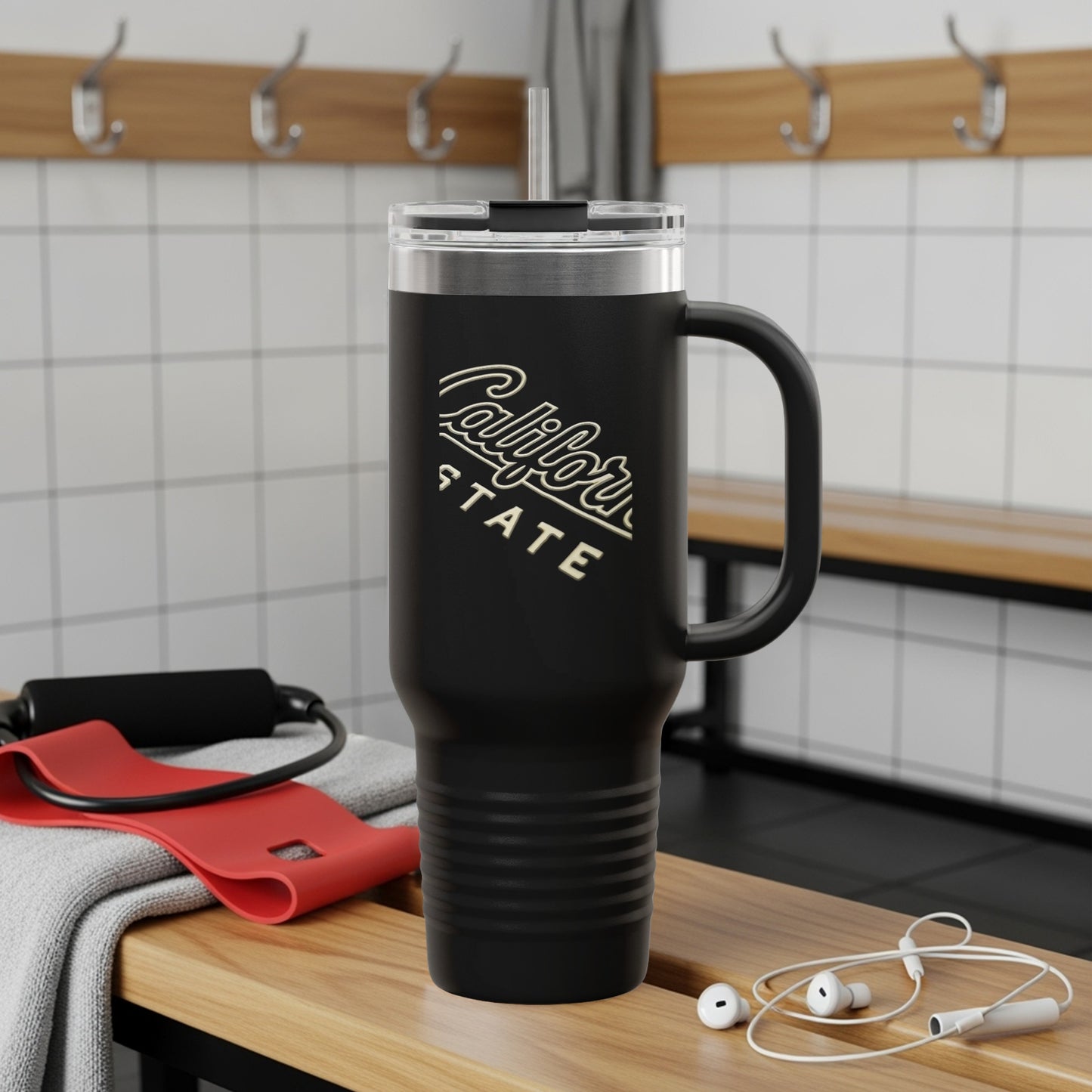 Black tumbler with "California State" logo, handle, straw, and earbuds.