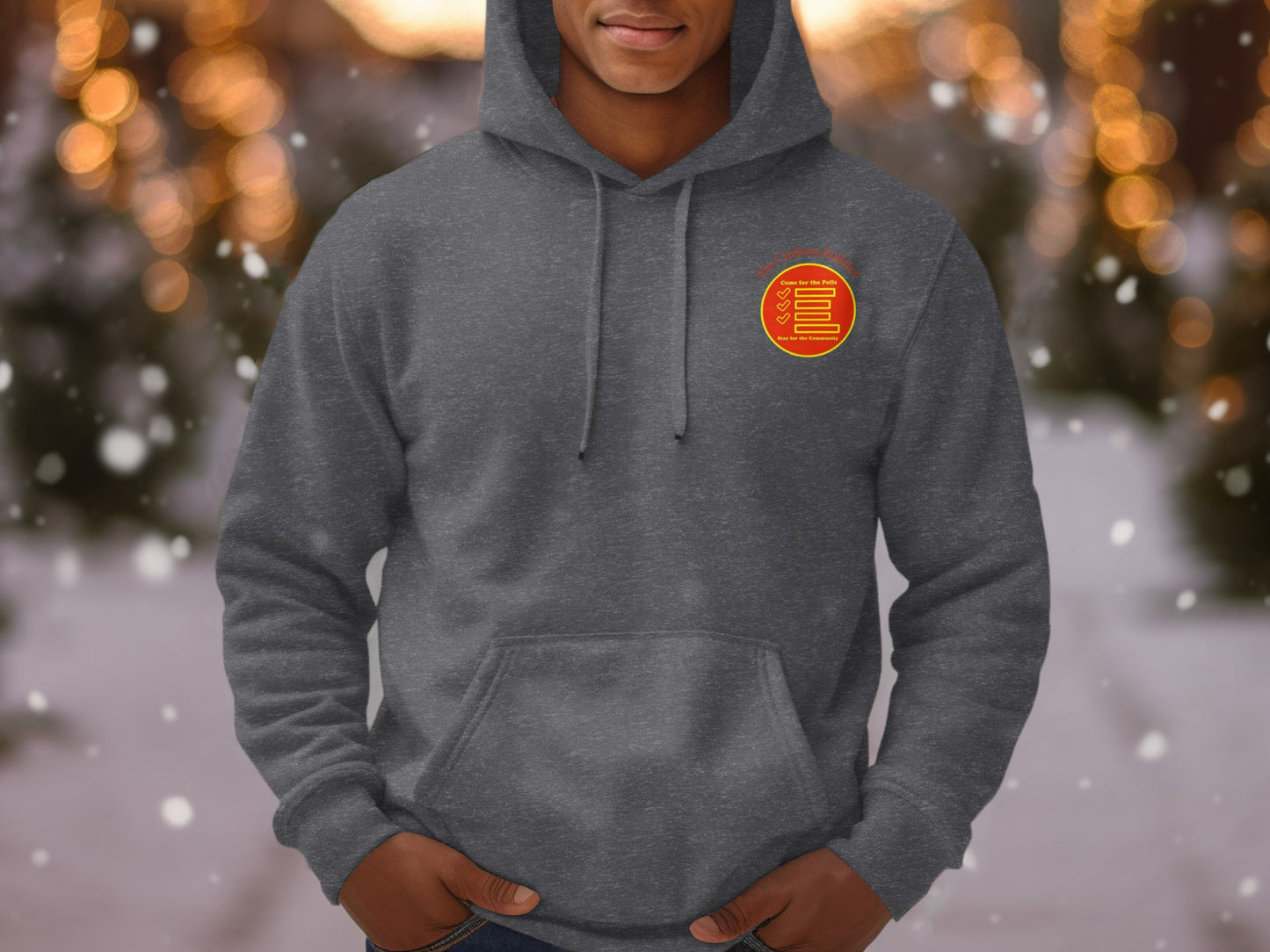Gray hoodie with red and yellow circular emblem on chest.