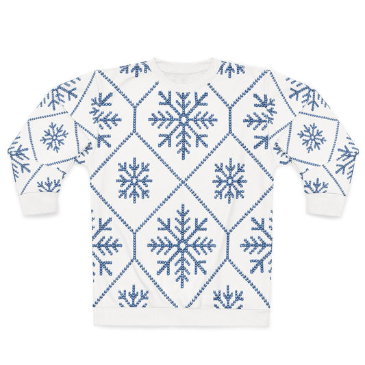 White sweatshirt with a repeating blue snowflake and geometric pattern.