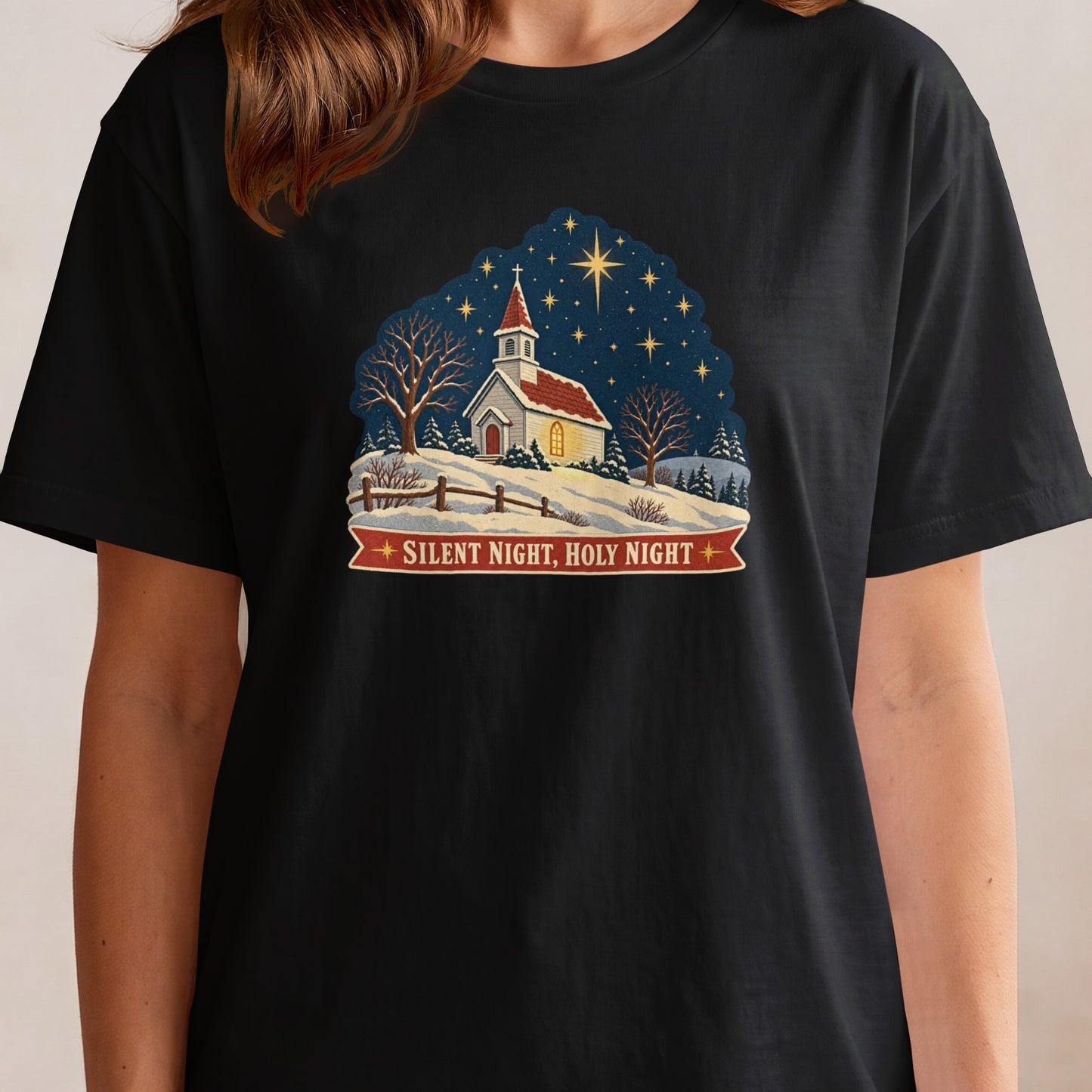 Christmas t-shirt featuring a snowy church scene under a starry sky with the text "Silent Night, Holy Night".
