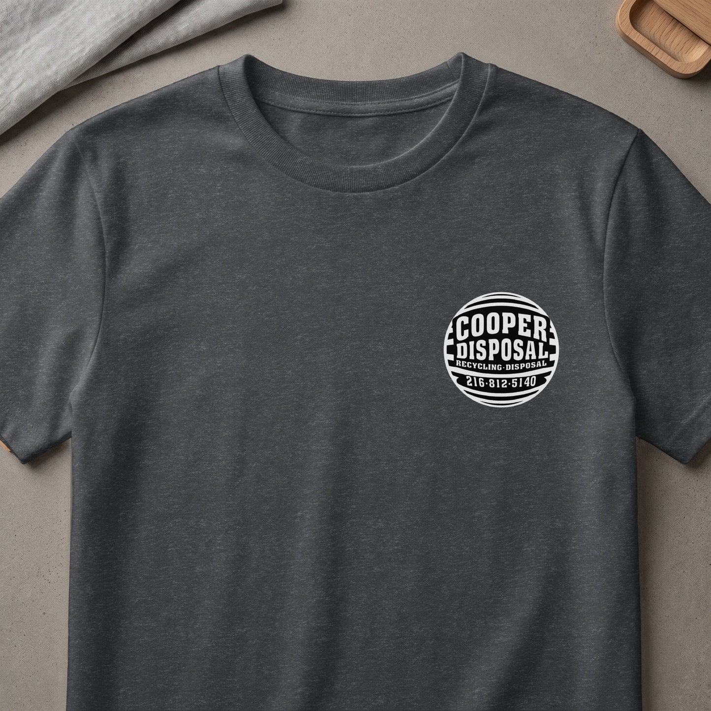 Dark gray t-shirt with Cooper Disposal recycling logo on chest.