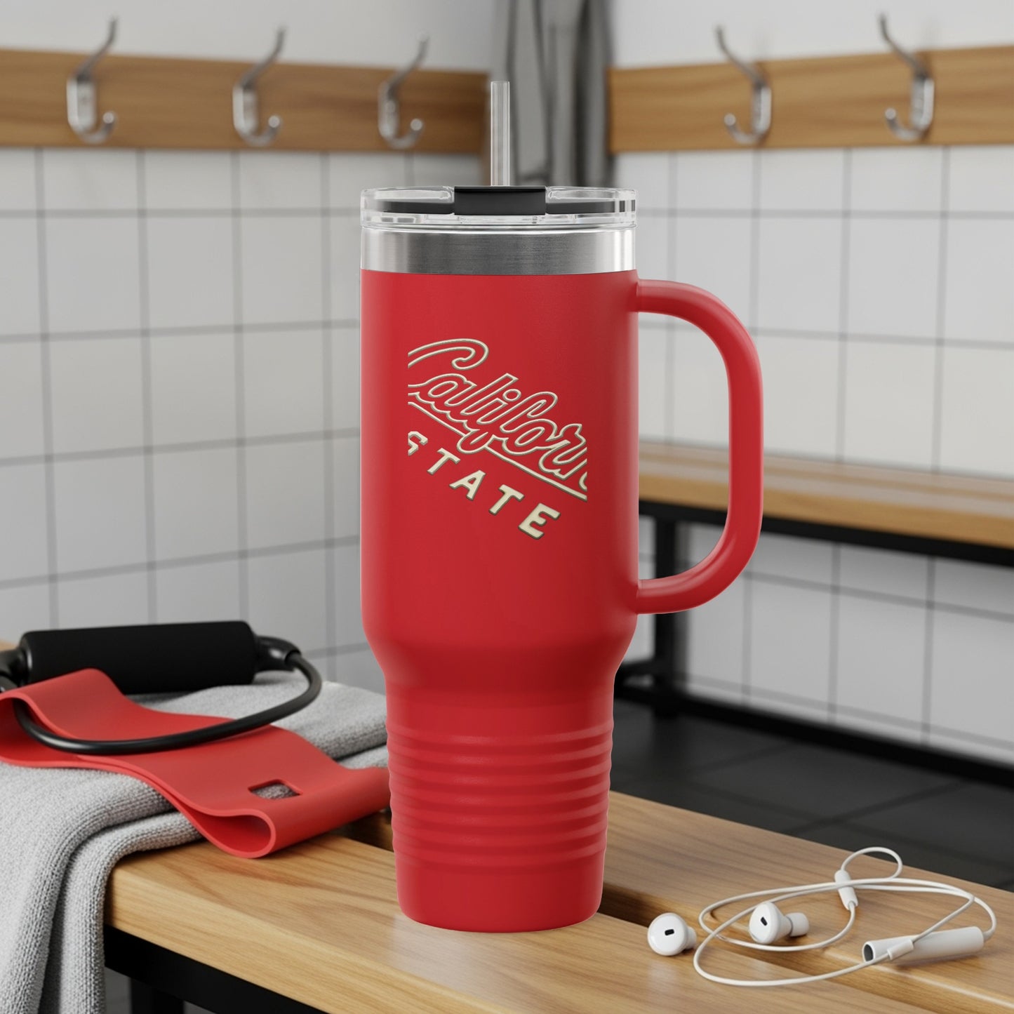 Red tumbler with "California State" logo, handle, and lid.