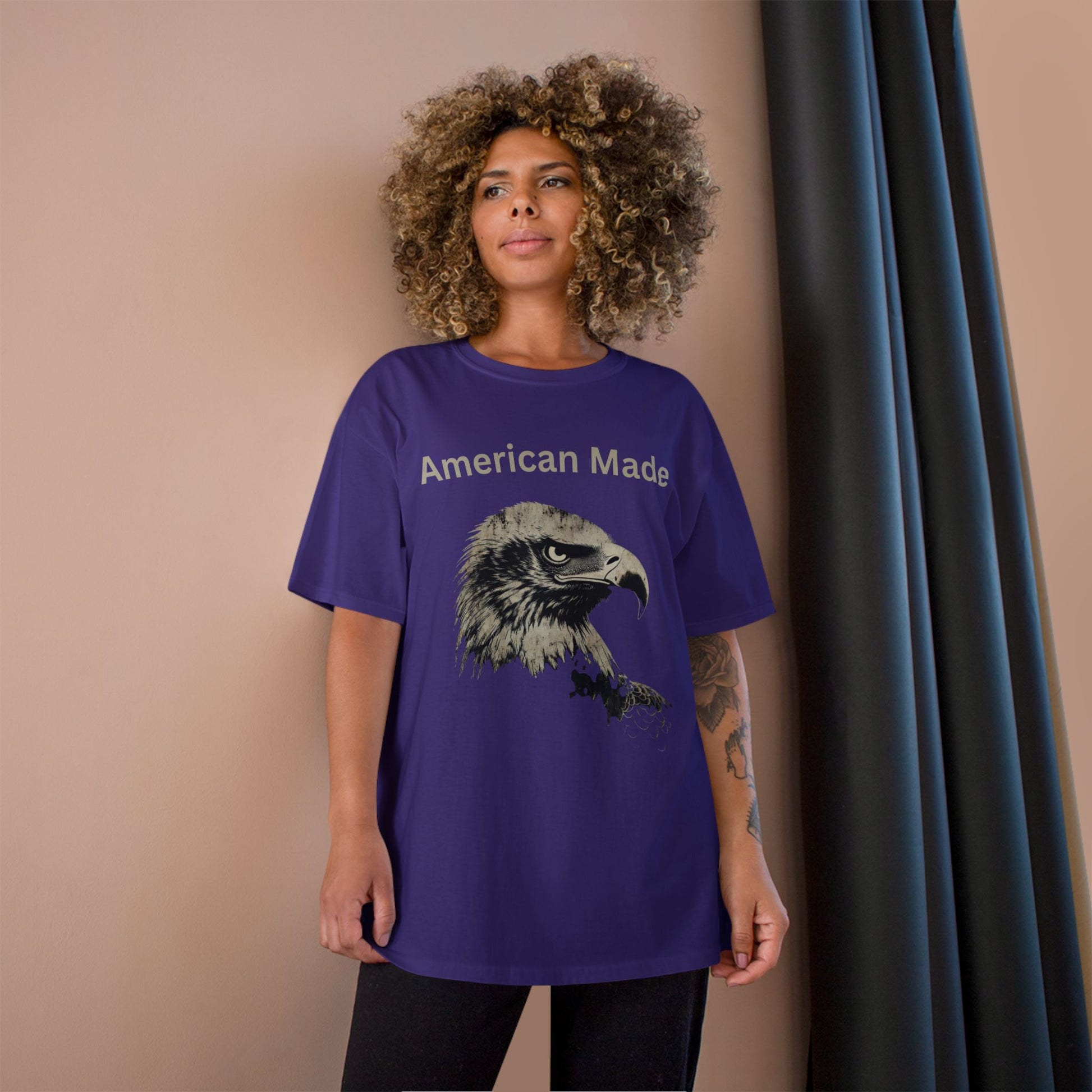 American Made text above an eagle head on a Champion Tee