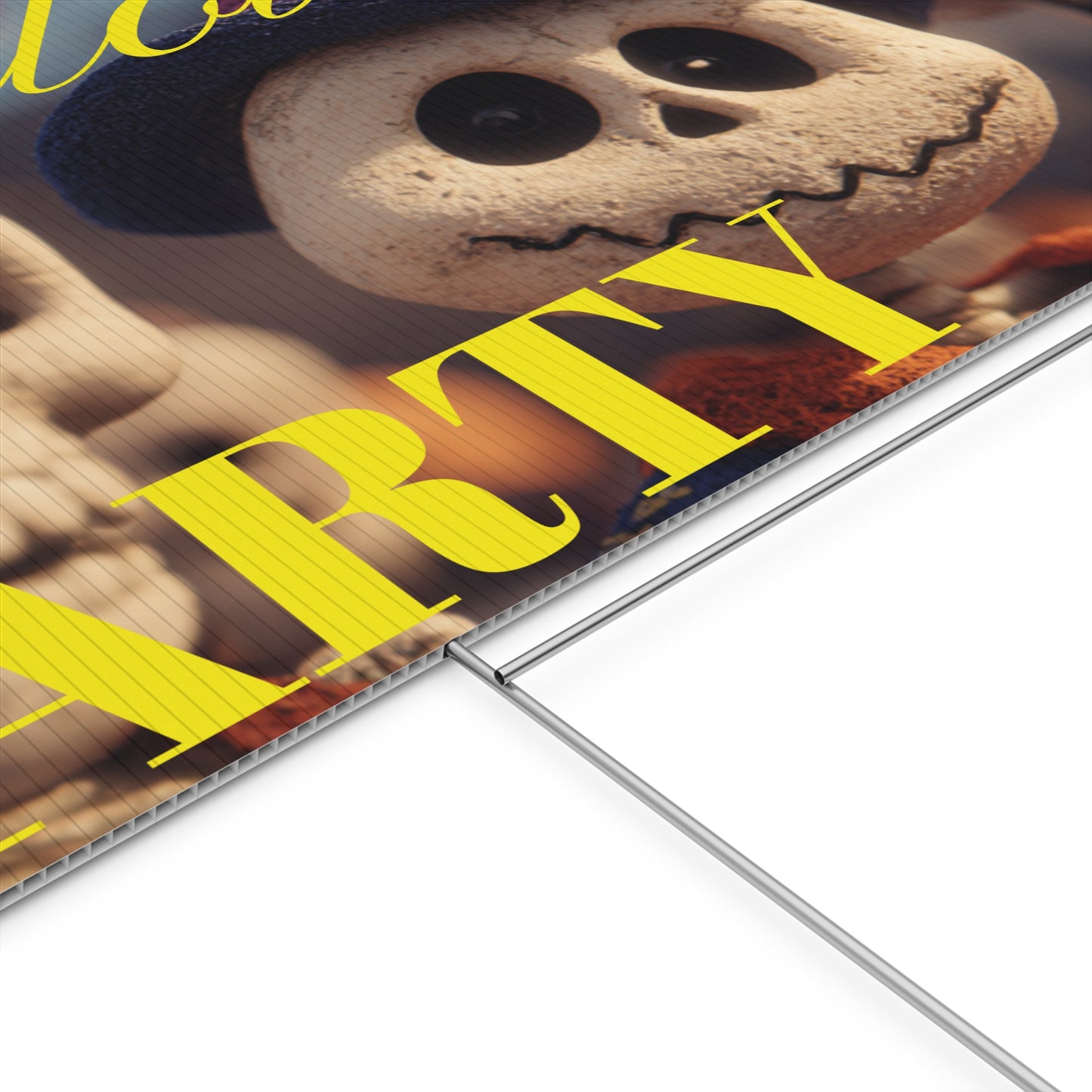 Halloween-themed party sign with cartoon characters on a grassy lawn