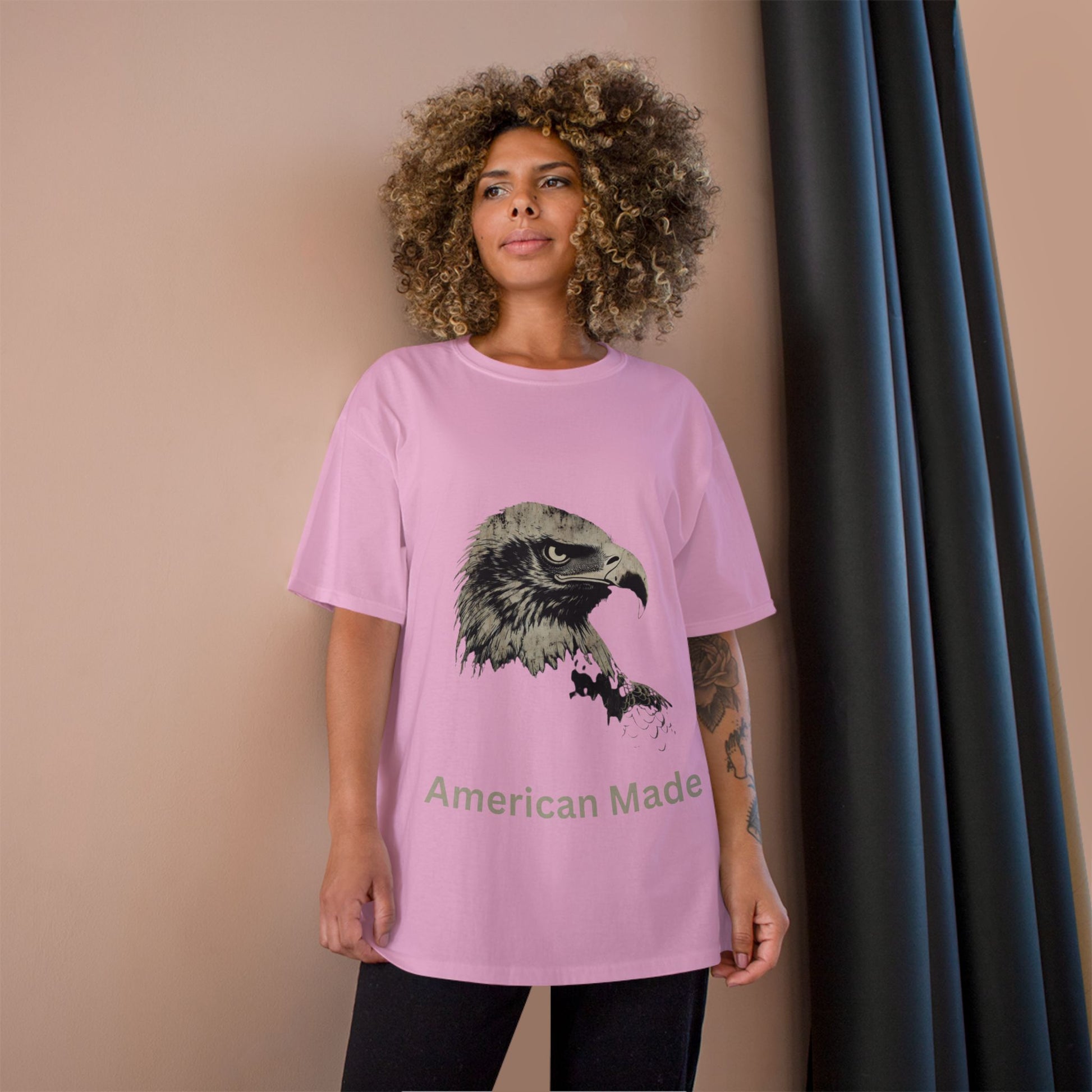 American Made text below an eagle head on a Champion Tee
