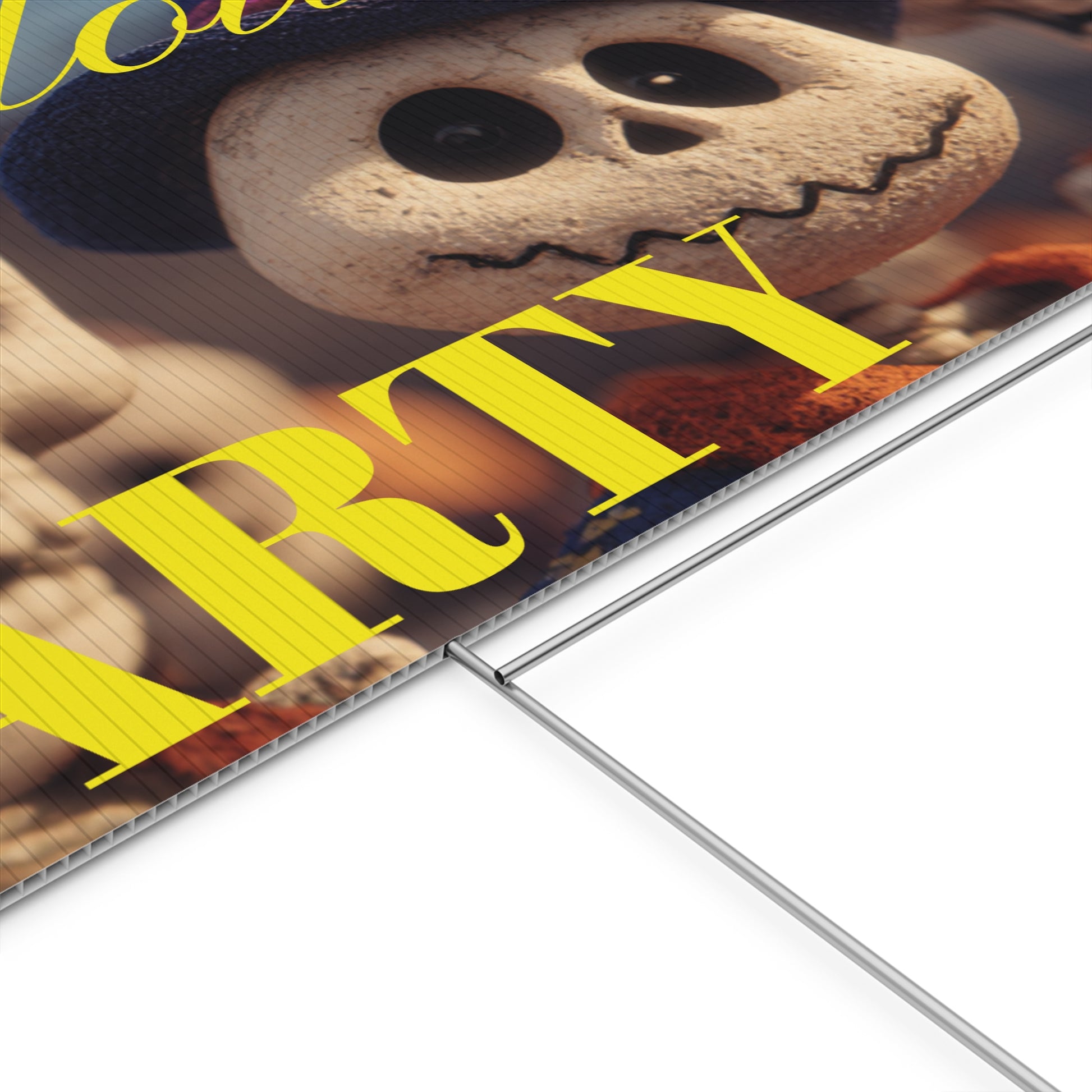 Halloween-themed party sign with cartoon characters on a grassy lawn