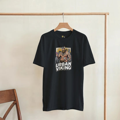 Person wearing a gray t-shirt with 'Urban Viking' graphic design in an indoor setting