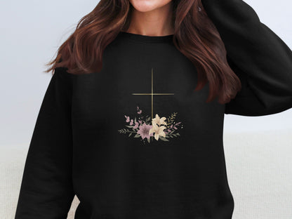 Black sweatshirt with floral cross graphic.