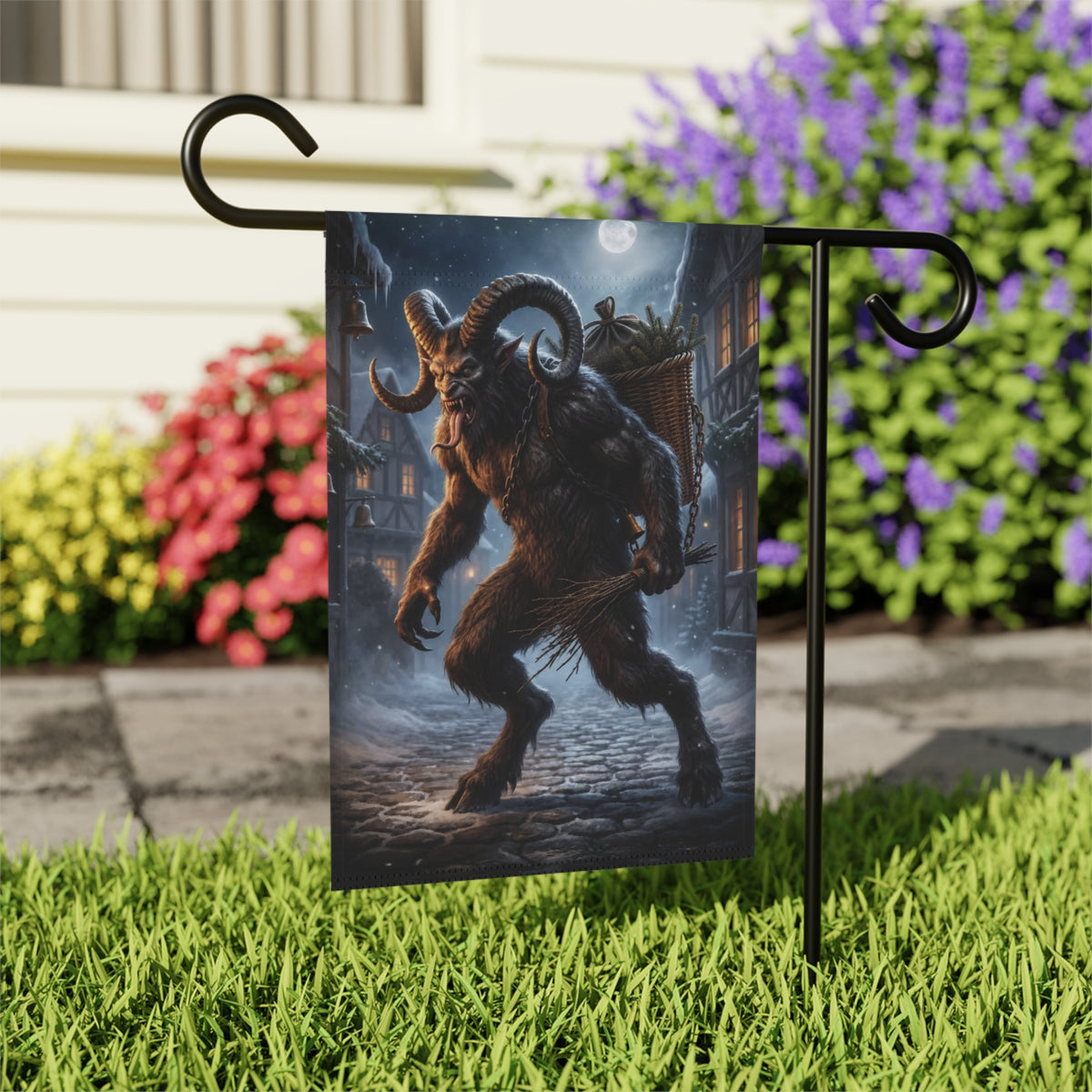 Garden flag featuring Krampus with a basket and birch branches in a snowy village.