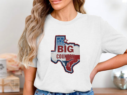 White t-shirt with Texas shape graphic, "Big Country" text, star, and oil derrick.