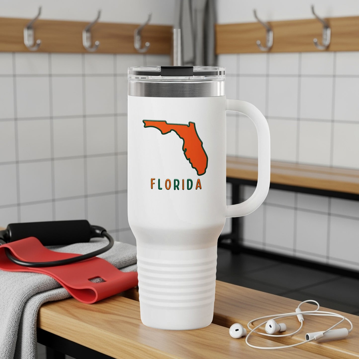 White tumbler with orange Florida outline and "FLORIDA" text.
