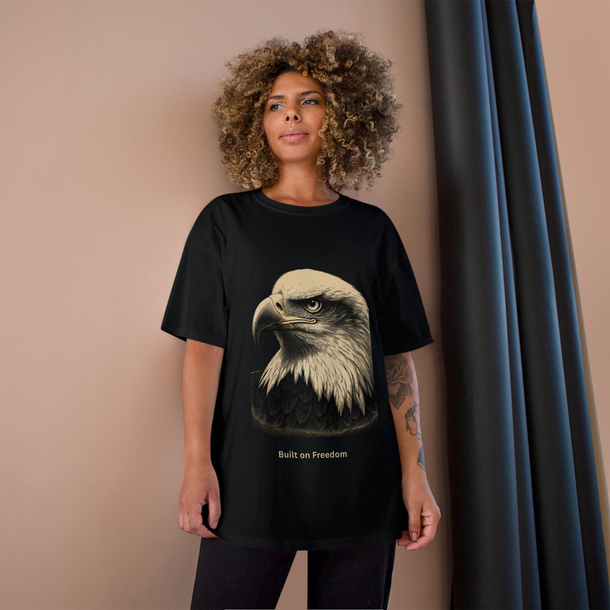 Engraved Eagle - Built for Strength - text on the muted of a Champion Tee