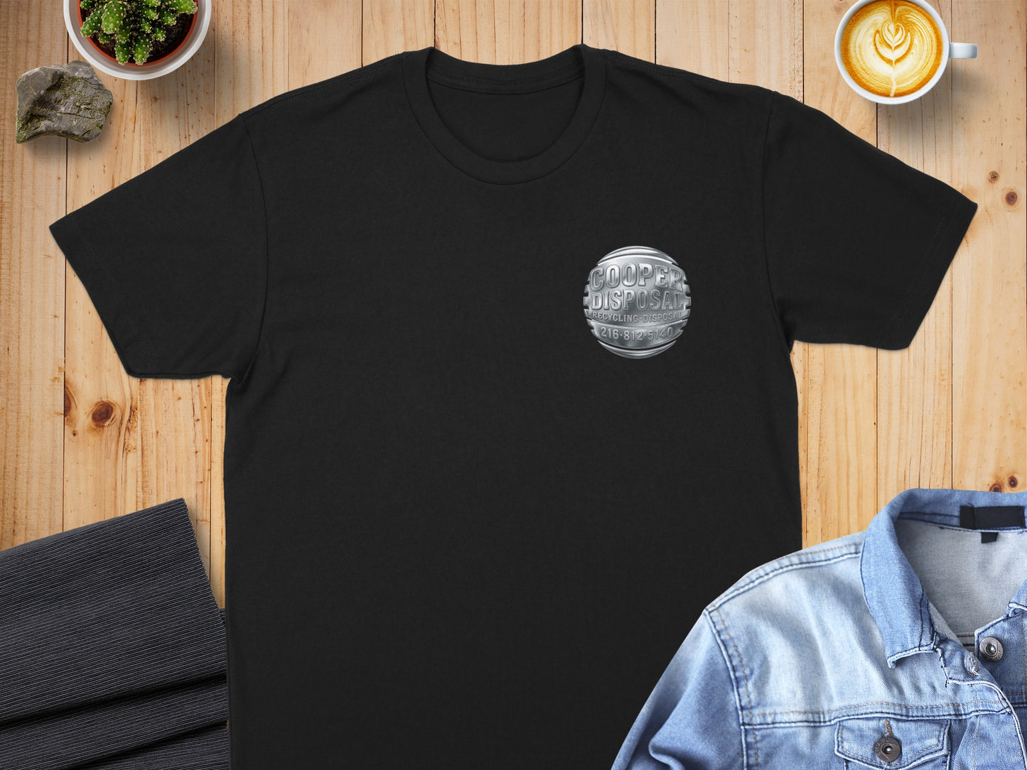 Black t-shirt with Cooper Disposal logo on chest.