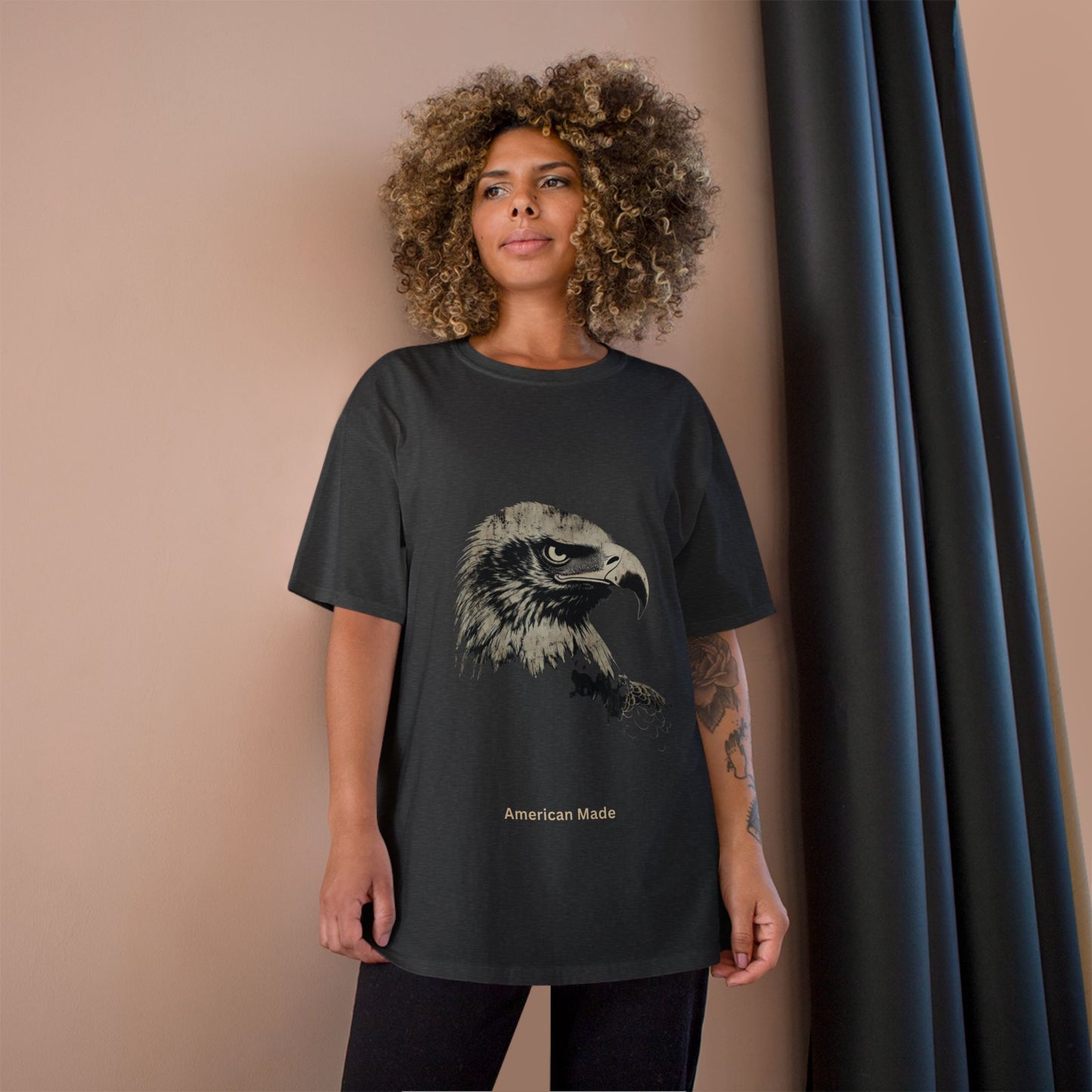 American Made small font text below an eagle head on a Champion Tee