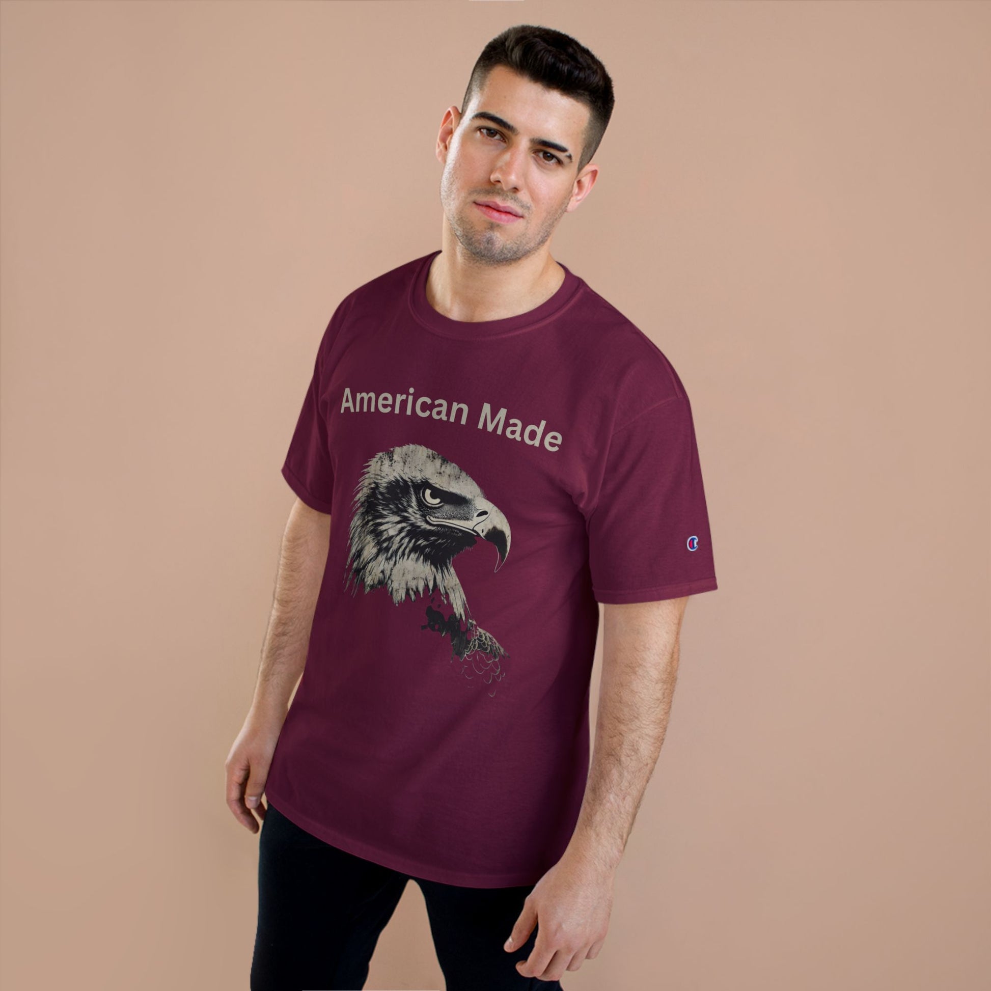 American Made text above an eagle head on a Champion Tee