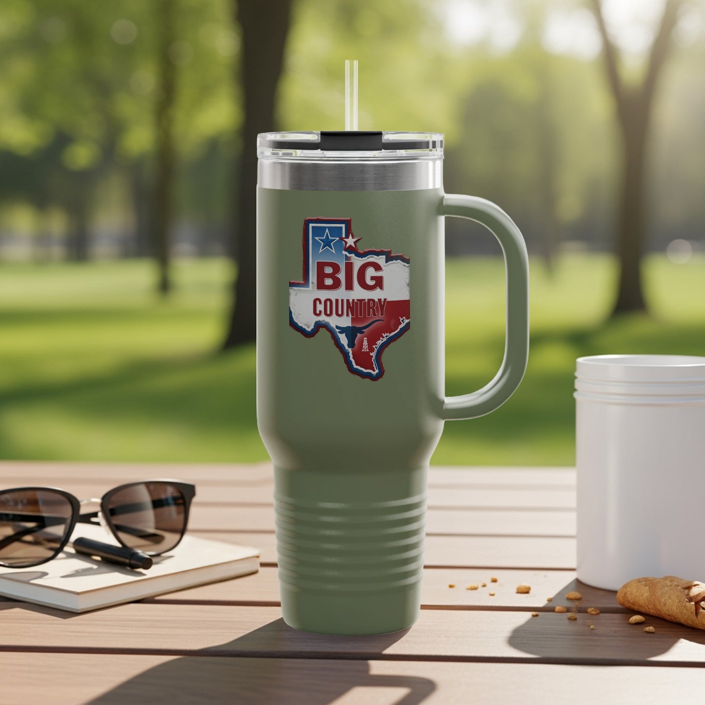 Travel mug with Texas outline and text.