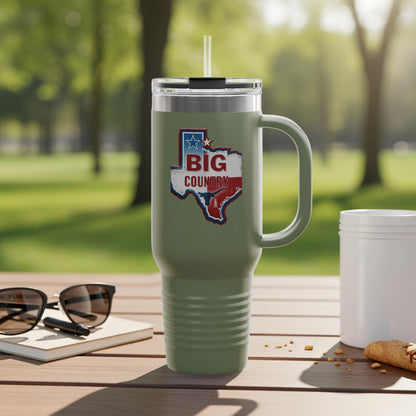 Travel mug with Texas outline and text.