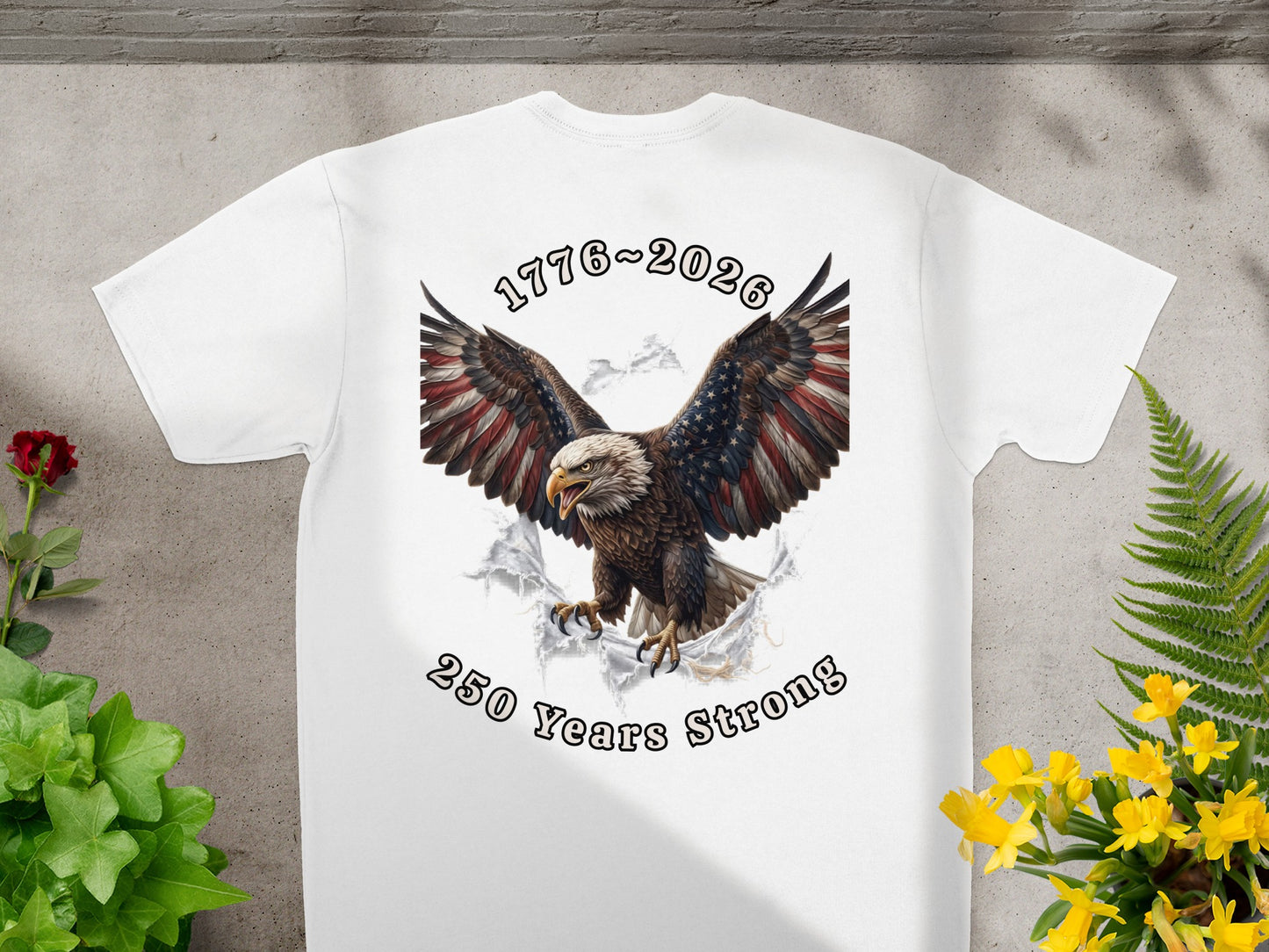 White t-shirt with eagle and "1776~2026 250 Years Strong" text.