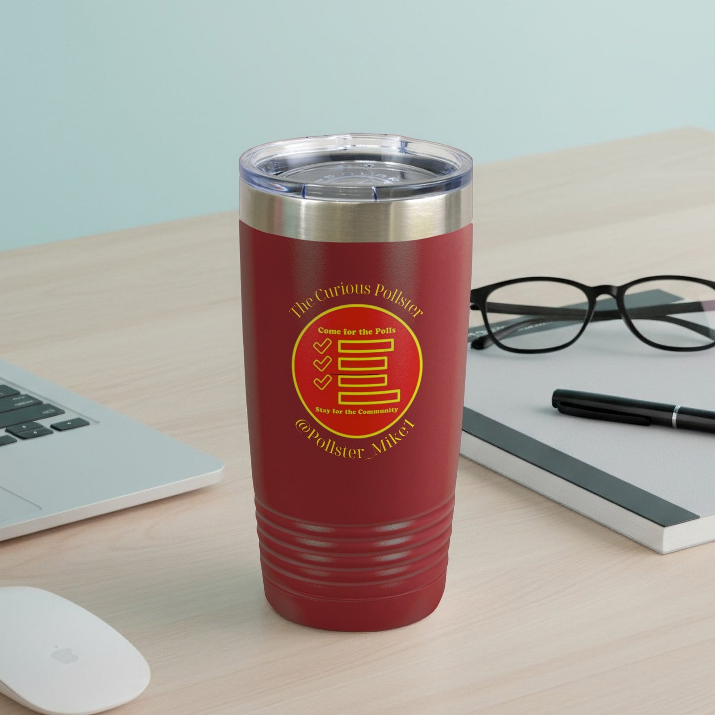 Red tumbler with "The Curious Pollster" text and graphic.