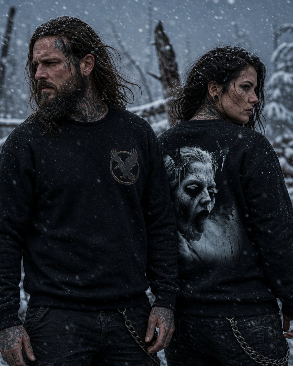 Two models wearing black Dark Folklore Series Wendigo crewneck sweatshirts, front view, with the raven in flight emblem on the chest.