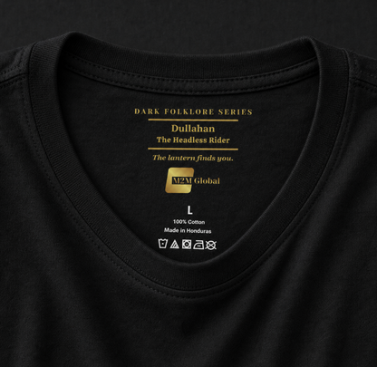 Inside neck of a black t-shirt showing the gold Dark Folklore Series label: Dullahan, The Headless Rider, with the original size and care label below.