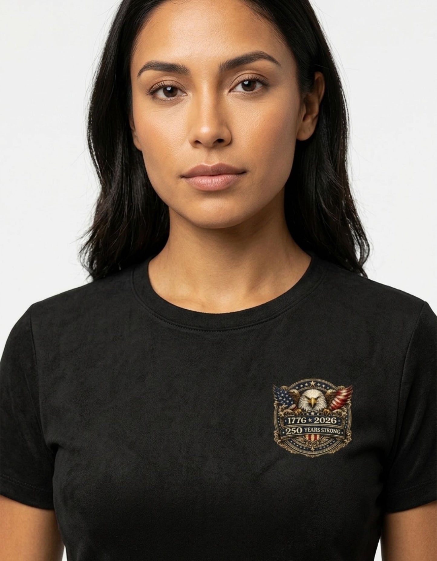 Woman wearing a black t-shirt with a logo on a white background
