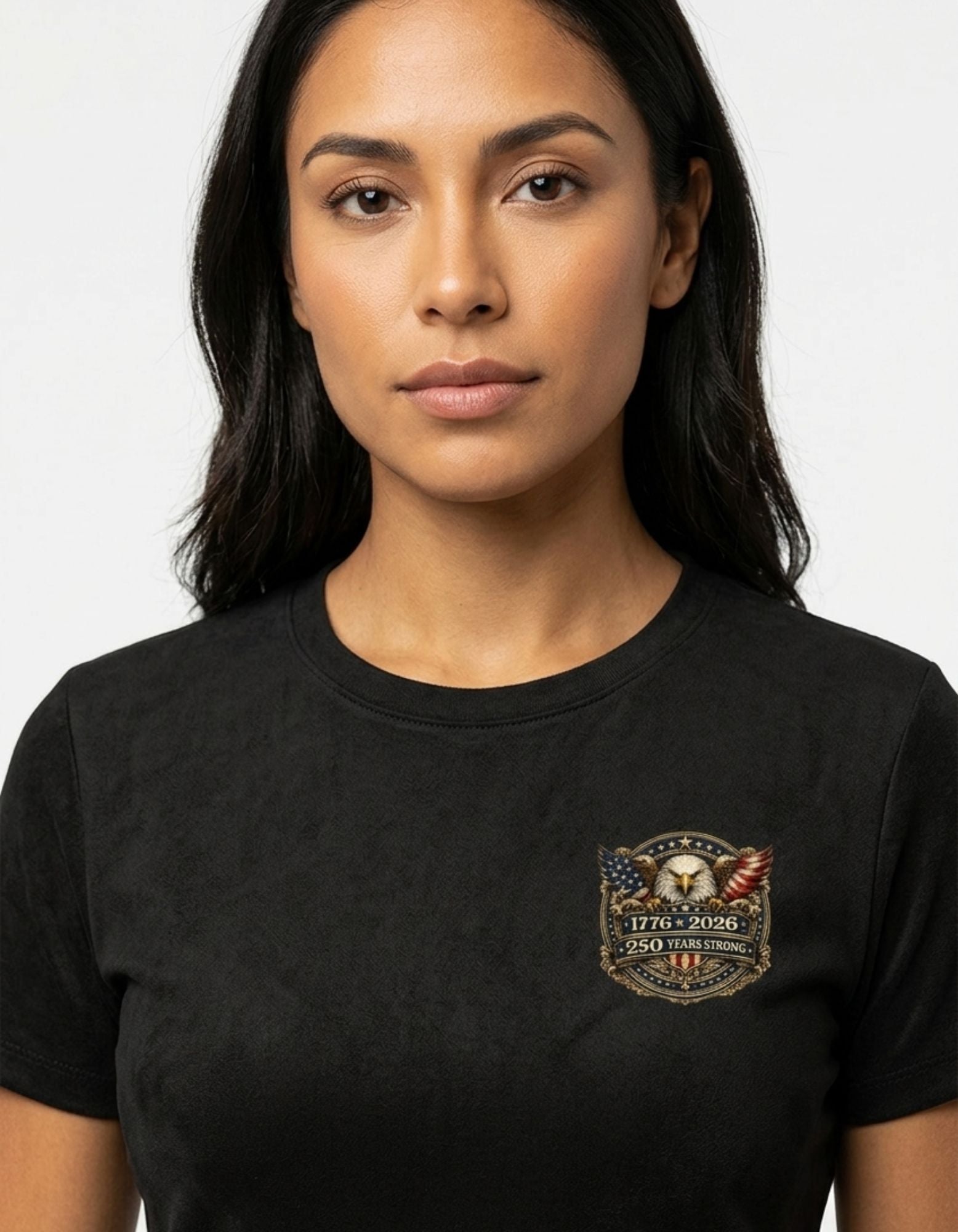 Woman wearing a black t-shirt with a logo on a white background