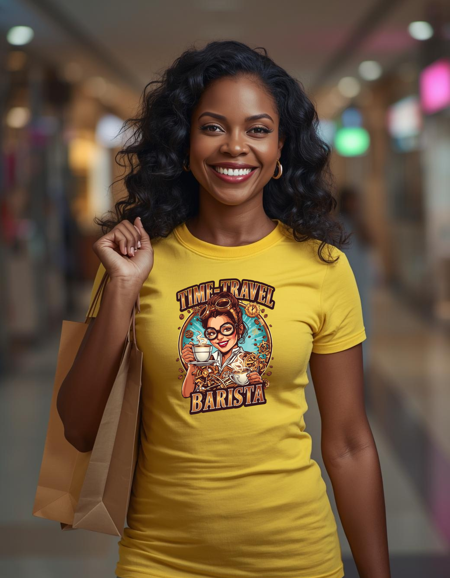 Woman wearing a yellow t-shirt with a 'Time Travel Barista' design, holding a brown paper bag in a blurred indoor setting.