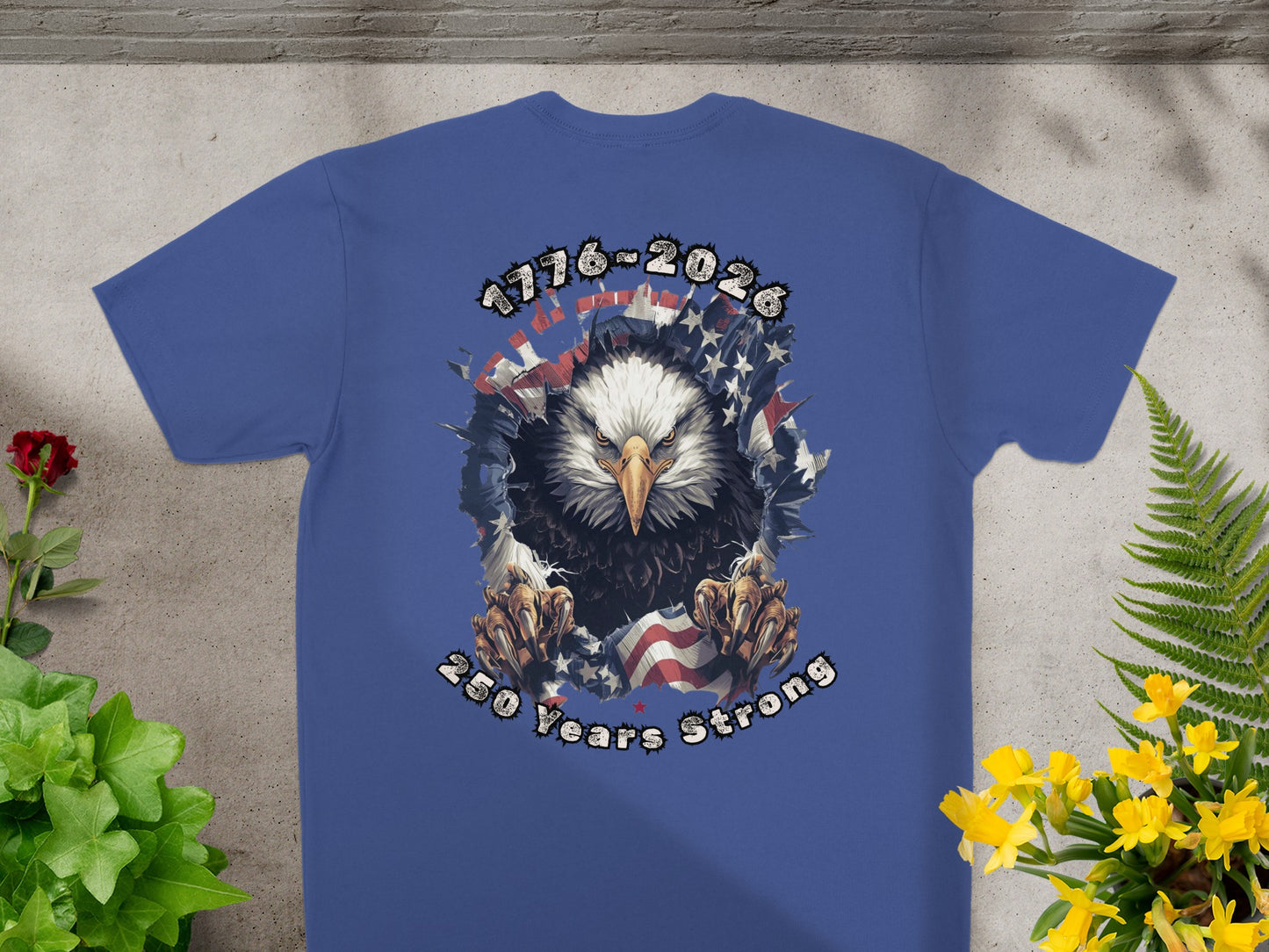 Blue t-shirt with eagle graphic and text "1776-2026 250 Years Strong".