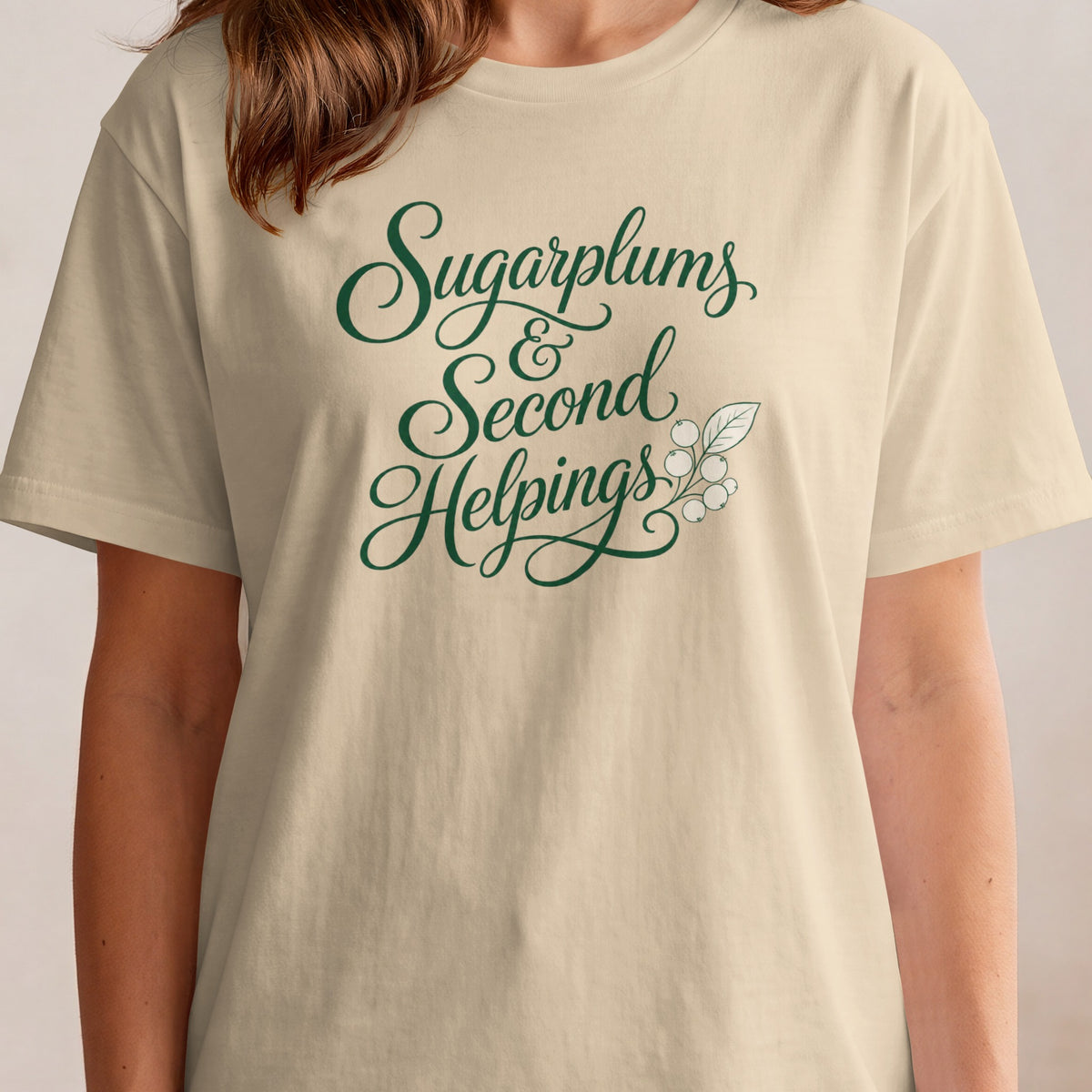 Cream t-shirt with "Sugarplums & Second Helpings" text and berry branch graphic.