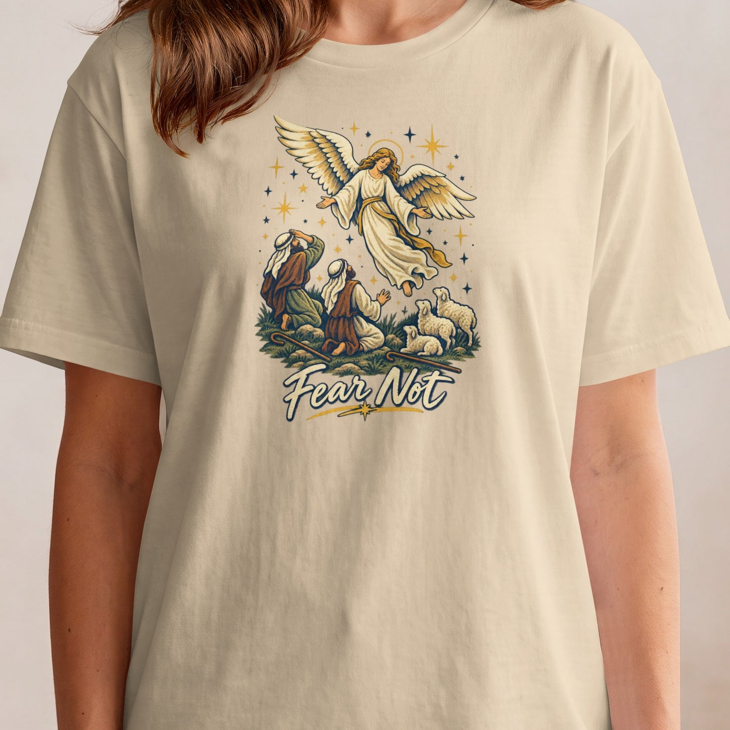 Angel appearing to shepherds and sheep with "Fear Not" text.