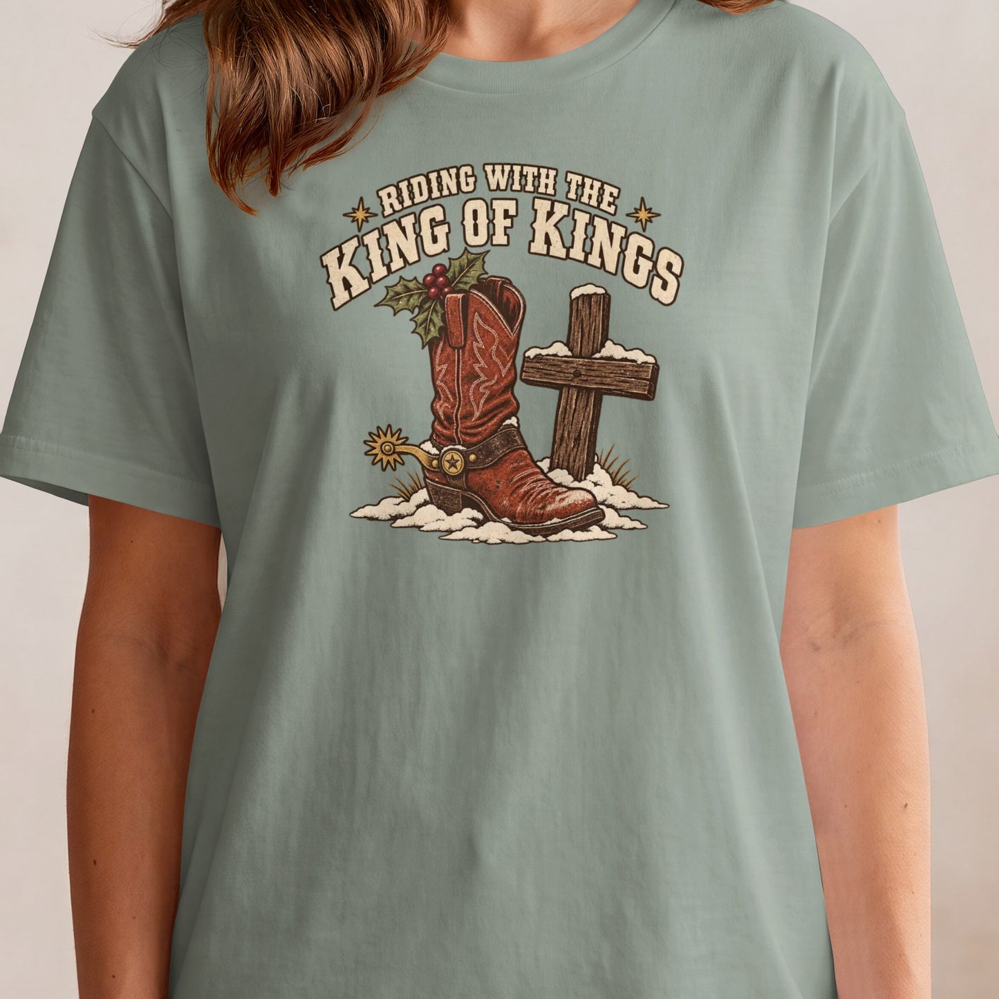 Western cowboy boot with holly and cross, says "Riding with the King of Kings".
