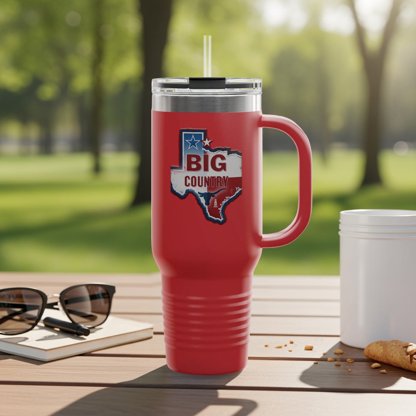 Red travel mug with "Big Country" text and Texas map graphic.