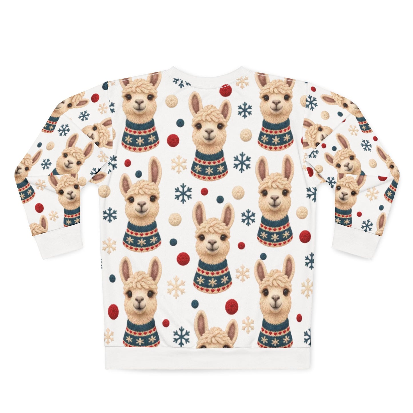 White sweatshirt with a pattern of llamas wearing sweaters and snowflakes.
