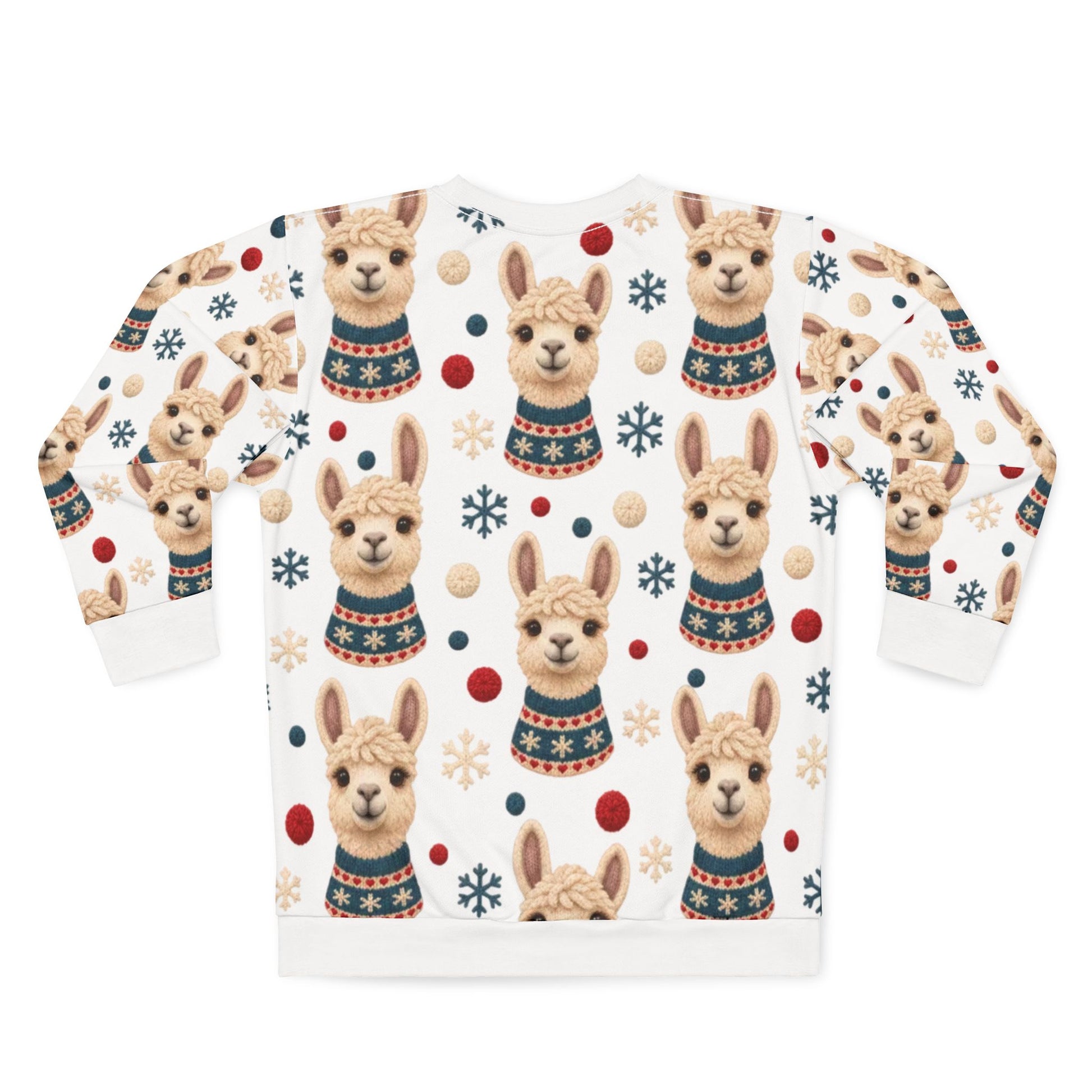 White sweatshirt with a pattern of llamas wearing sweaters and snowflakes.