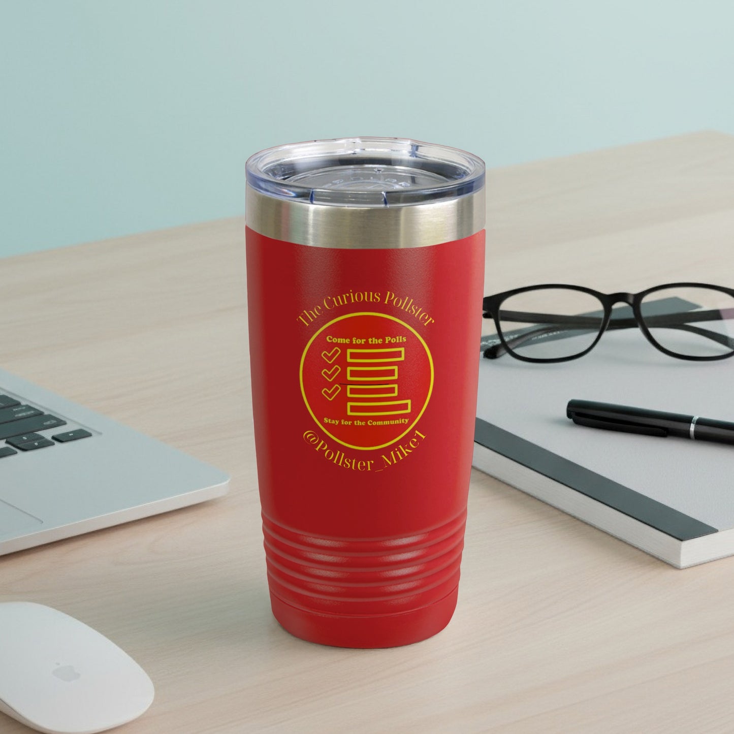 Red tumbler with "The Curious Pollster" text and community-focused slogans.